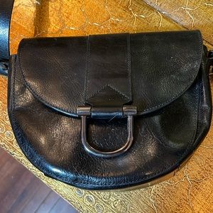 HALSTON black leather signature cross body with adjustable strap. Gorgeous